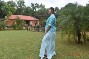 “White and sky blue skirt set with a side slit and pockets, paired with a matching top. Perfect blend of style and comfort.”BY SMITA SINHA